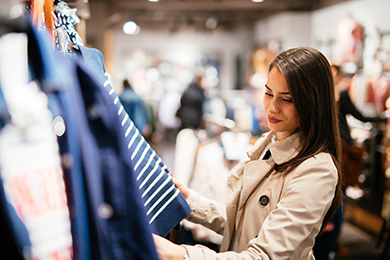woman looking at clothes